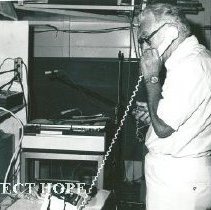 Dr. Joseph Wagner talking to Washington via COMSAT.